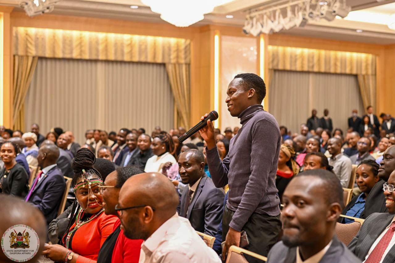 man speaking in event